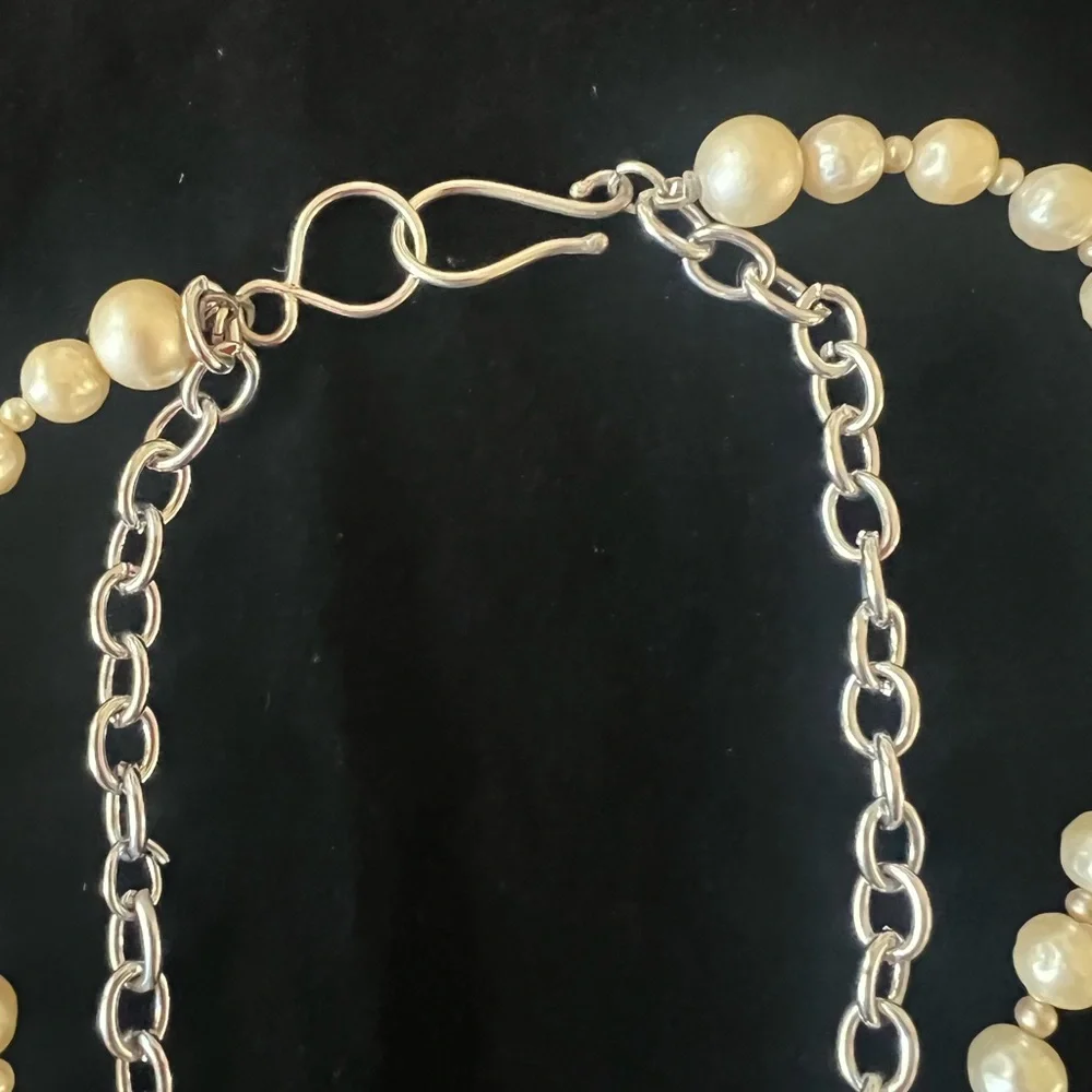 Elegant Silver and Cream Charm Necklace